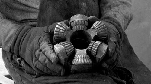 Roughneck holding a 1920’s era drill bit2
