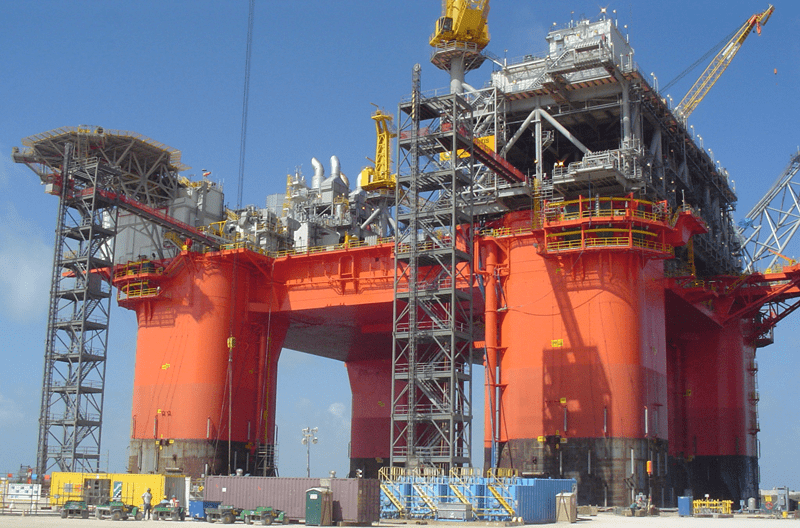 Flushing Rotary Equipment of Contaminants and Excess Costs 1 Offshore platform under construction. Flushing services occur at this stage and then on the commissioning side afterwards.