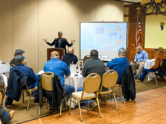 Jason Spiess answering questions at an API Dickinson Meeting