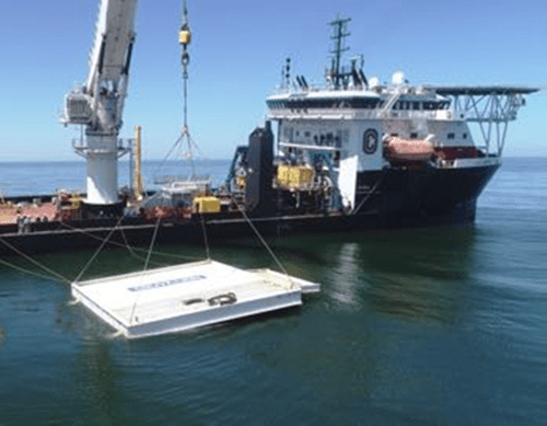 The Couvillion collection dome lowered off a support vessel to the seafloor.