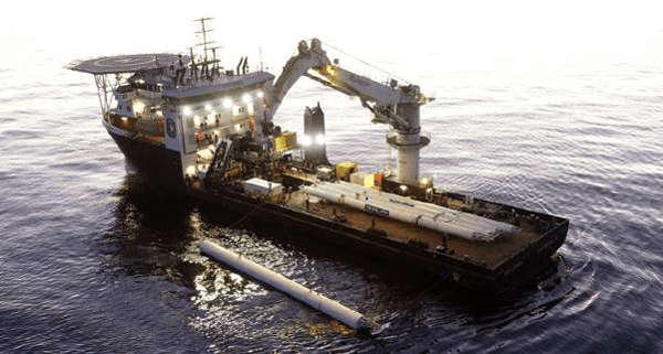Additional system components offloaded from the support vessel in preparation of subsea construction.