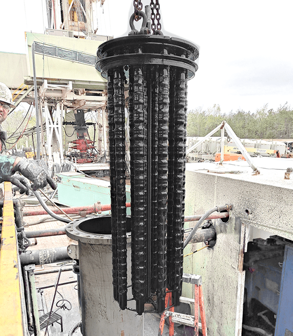 The picture shows a magnetic filter element that has captured contaminants.