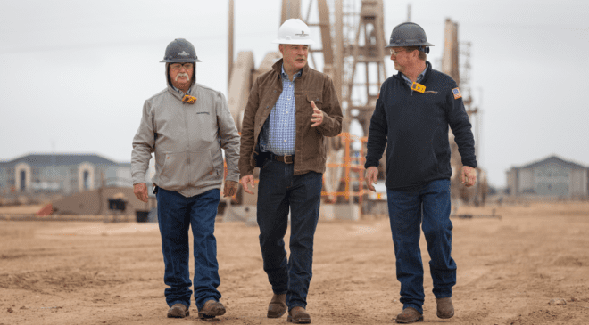 API’s Mike Sommers (C) tours Diamondback Energy with employees Rick Lewis (L) and Carey Matthews (R) in Midland, TX.