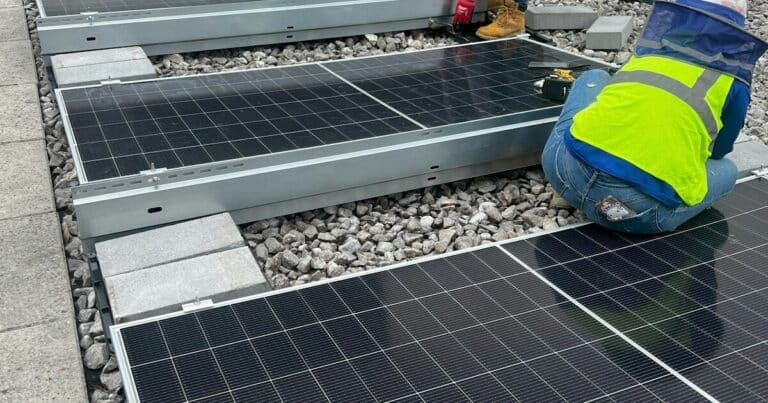 Atop a 3.5 acre Maryland convention center roof built to hold crowds not current, 4,696 panels went live, and the resort buys half its power from the sun 11 Rows of solar panels atop a convention center roof in Maryland, 3 5 acre