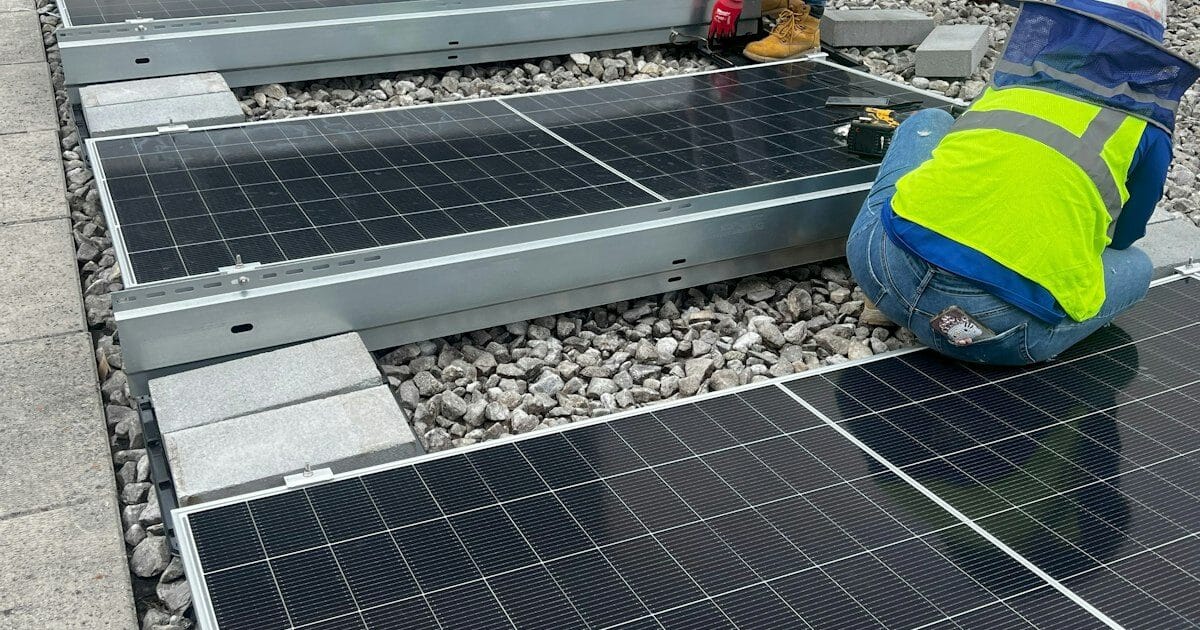 Rows of solar panels atop a convention center roof in Maryland, 3 5 acre