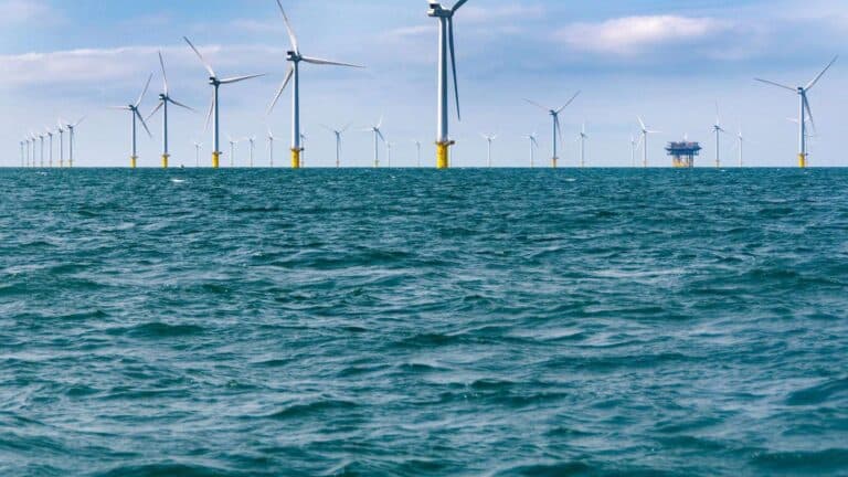 massive wind farm with several turbines
